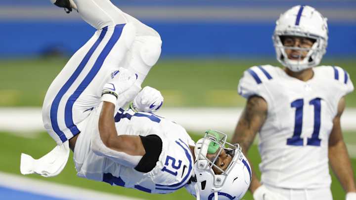Colts Rout Lions, Tie For First