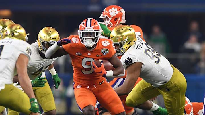 From Cap and Gown to Orange Britches: Travis Etienne Reflects on Senior Season From Cap and Gown to Orange Britches: Travis Etienne Reflects on Senior Season