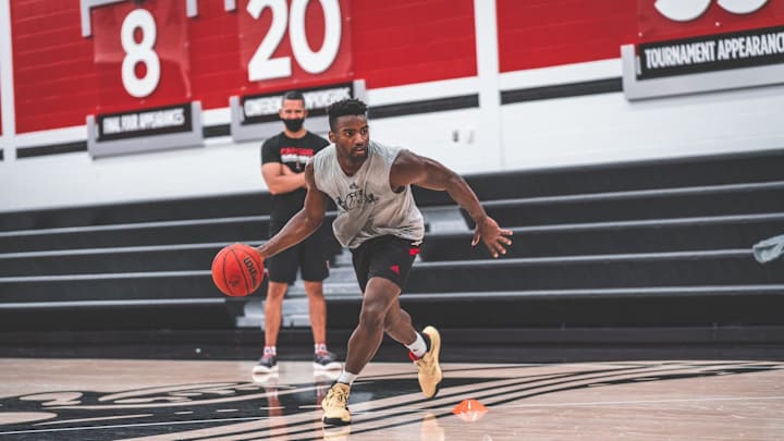 Guard Charles Minlend Will Not Return to Louisville