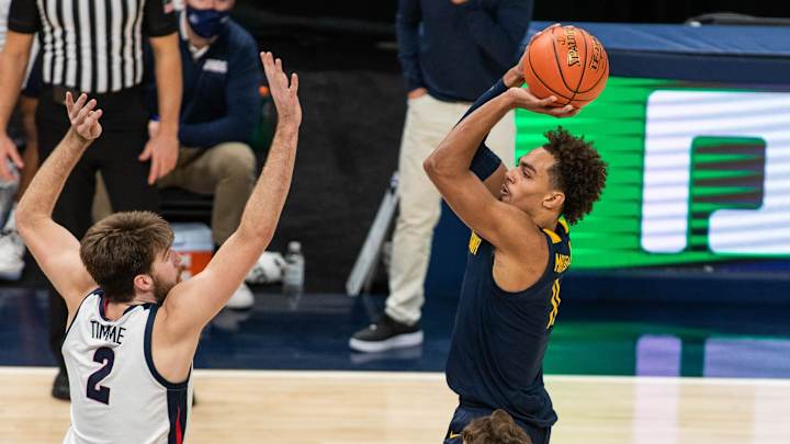 Spread & Over/Under Predictions for WVU vs Northeastern