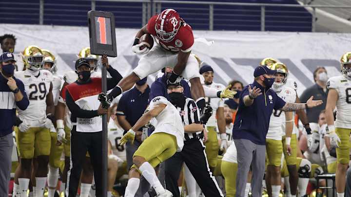 Alabama Running Back Najee Harris Hurdles Notre Dame Defender During Big Run Alabama Running Back Najee Harris Hurdles Notre Dame Defender During Big Run