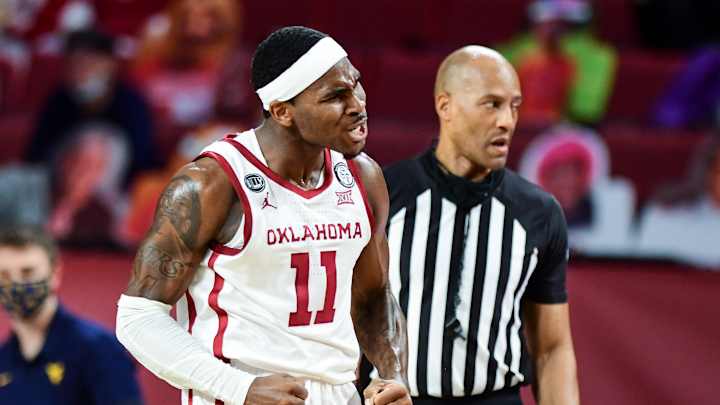 Oklahoma holds off No. 9 West Virginia 75-71 Oklahoma holds off No. 9 West Virginia 75-71