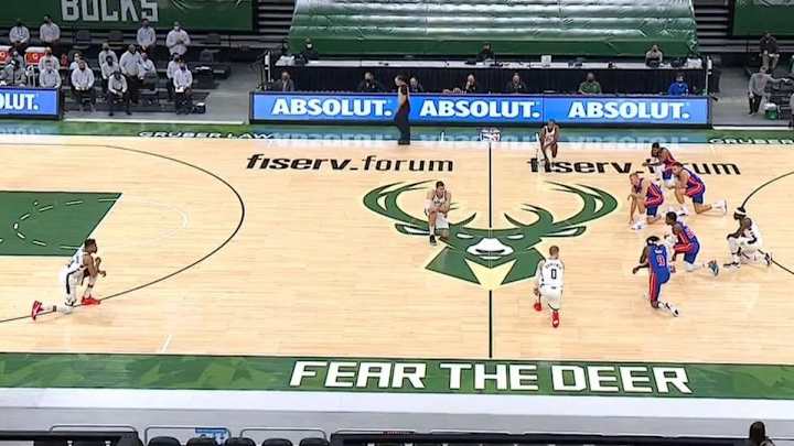 Bucks, Pistons Kneel to Start Game in Protest Following Capitol Siege, Jacob Blake Decision Bucks, Pistons Kneel to Start Game in Protest Following Capitol Siege, Jacob Blake Decision