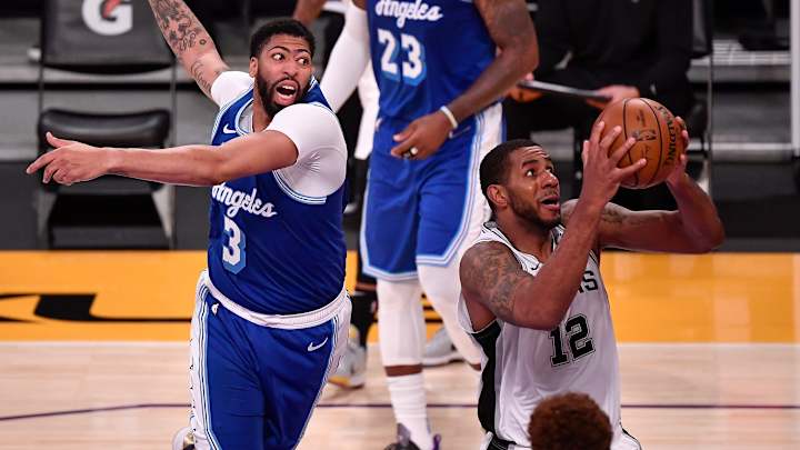 Spurs heat up from deep, run past listless Lakers