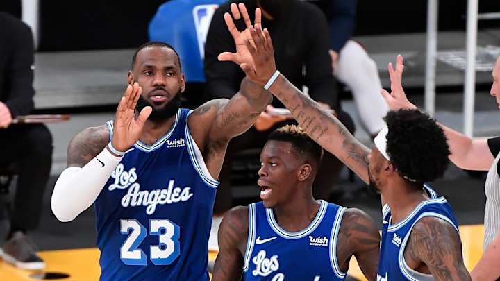 LeBron James posts triple-double, Lakers outhustle Nuggets
