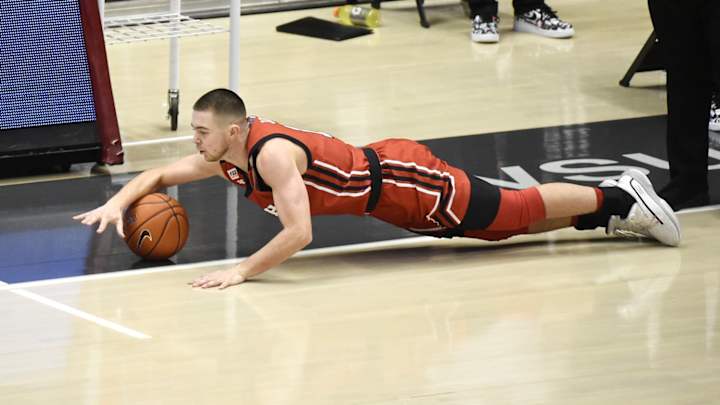 Stifling Defense Leads Utah To 73-58 Victory Over Arizona