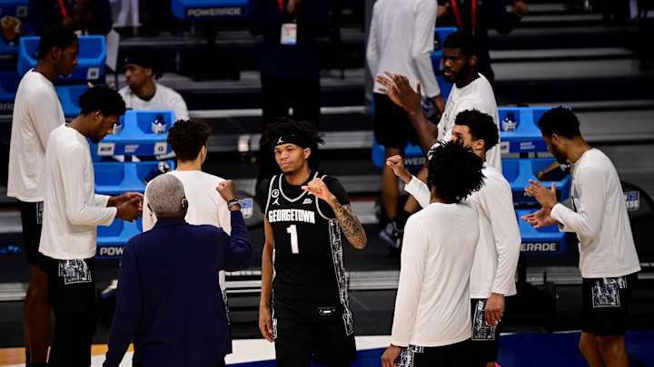 Coach Patrick Ewing, Georgetown Basketball Team Kneel for National Anthem