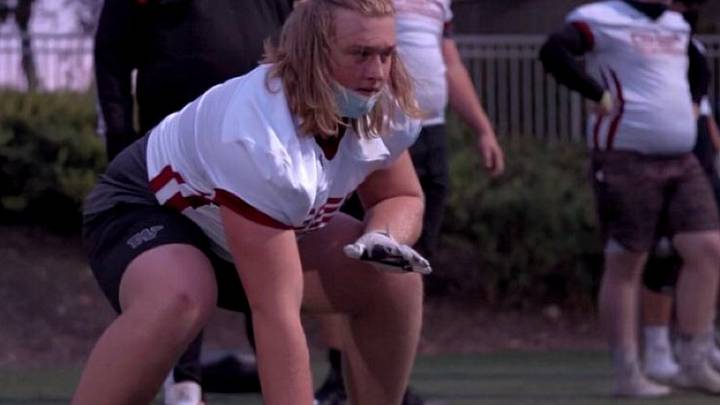 Younger Brother of UW Lineman Doesn't Ask for Applause, Just a Crisp Clap