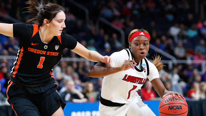 Louisville's Dana Evans surpasses 1,000 career points