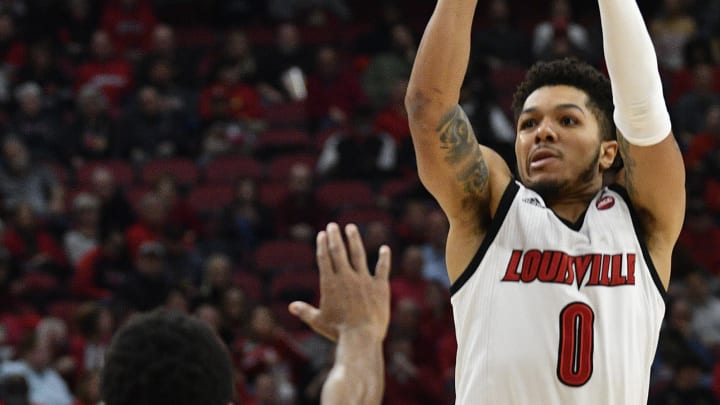 Louisville snaps nine-game losing streak to Virginia