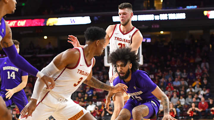 During Bleak Times, Huskies Freshman Playmaker Tries to Dish Out Hope