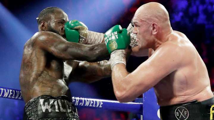 Wilder Keeping Trainer Who Threw in Towel vs. Fury