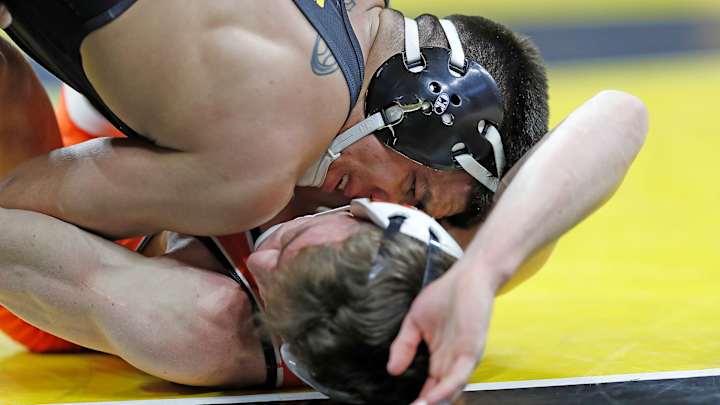 No. 1 Iowa Beats Cowboys, Sheets and Montalvo Only Cowboy Winners