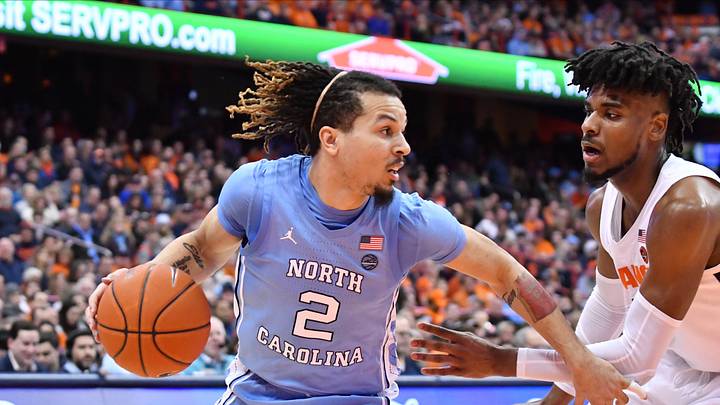 Who's team is this? Carolina Defeats Syracuse, 92-79