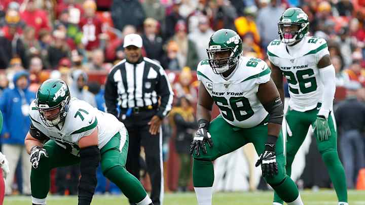 Report: Alex Lewis re-signs with the New York Jets Report: Alex Lewis re-signs with the New York Jets