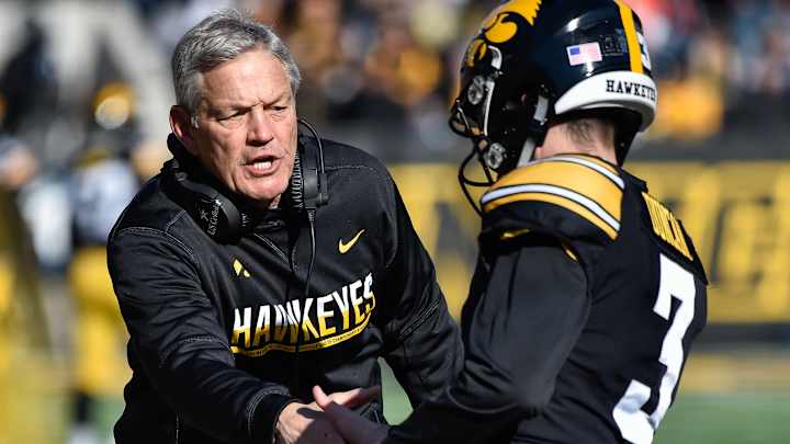 Thursday's Clicks: Ferentz Gets Work Done At Home