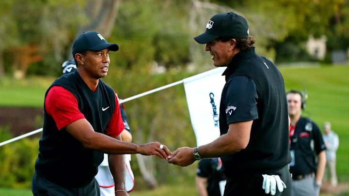 Tiger Woods and Peyton Manning take on Phil Mickelson and Tom Brady: Match II Betting Advice