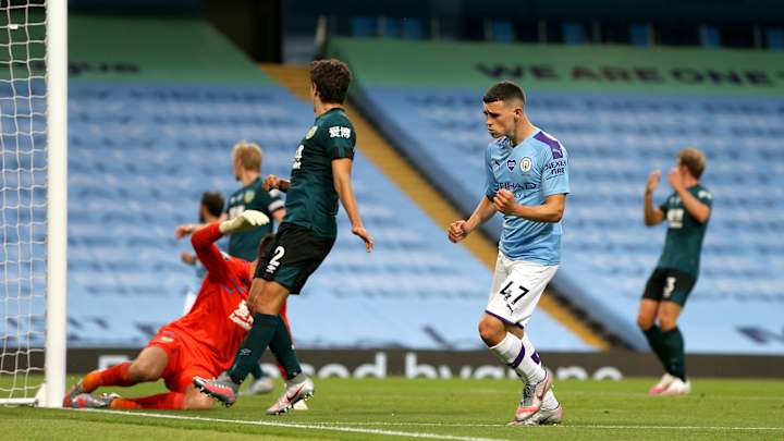 Man City Thrashes Burnley in Match Clouded By Aguero Injury, Plane Banner