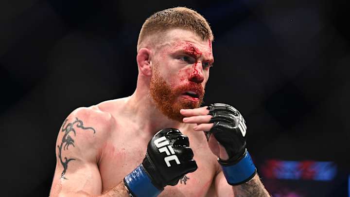 UFC Fighter Has Hilarious Interaction With Trash-Talking Fan