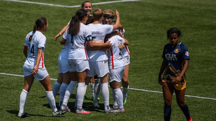 Reign Net First NWSL Challenge Cup Win on Balcer's Stoppage-Time Goal Reign Net First NWSL Challenge Cup Win on Balcer's Stoppage-Time Goal
