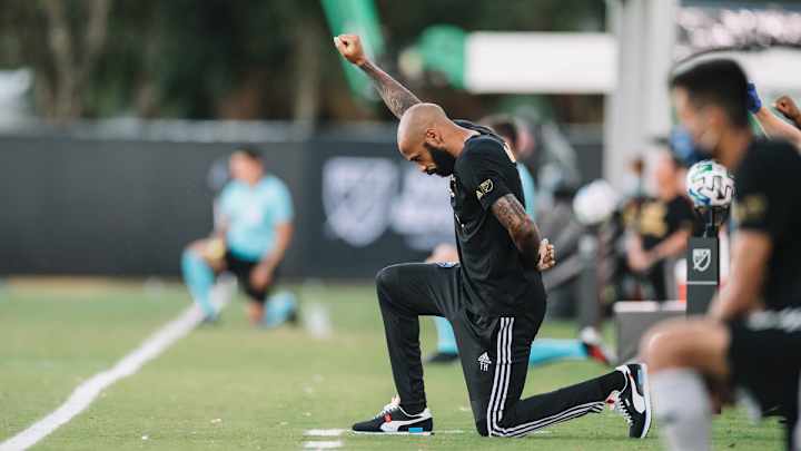 Montreal Impact Manager Thierry Henry Kneels During Game to Honor George Floyd Montreal Impact Manager Thierry Henry Kneels During Game to Honor George Floyd