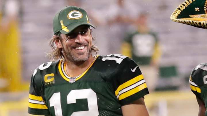 Aaron Rodgers Reveals His Long Hair Is for Mysterious Halloween Costume Aaron Rodgers Reveals His Long Hair Is for Mysterious Halloween Costume