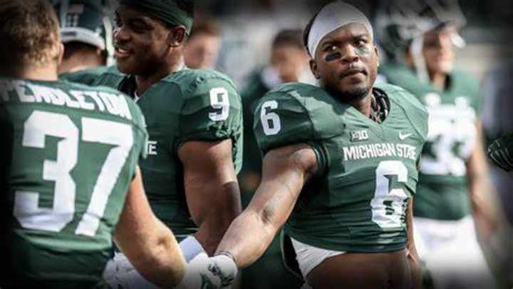 Michigan State rises in latest Coaches Poll