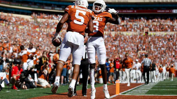 Texas' Bijan Robinson, Xavier Worthy Announced as Semifinalists for 'Earl Campbell' Award Texas' Bijan Robinson, Xavier Worthy Announced as Semifinalists for 'Earl Campbell' Award