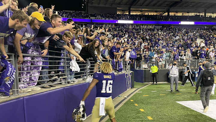 Husky Sideline of Inactive Players Was Star-Studded