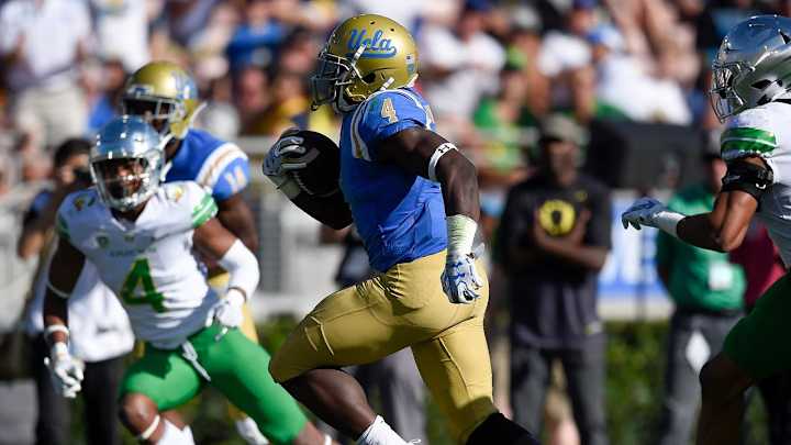 Today in History: UCLA Football, Bolu Olorunfunmi Leap to Home Victory Over Oregon