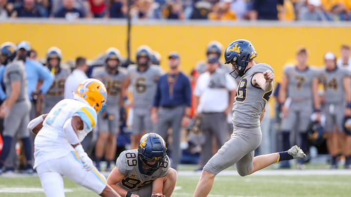 WATCH: Neal Brown Surprises Kicker Casey Legg with a Scholarship