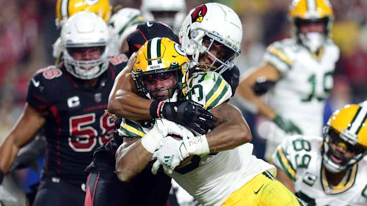 Undermanned and Undaunted, Packers Shock Cardinals