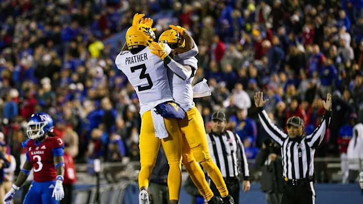 Mountaineers Move Past Jayhawks for Win No. 6 Mountaineers Move Past Jayhawks for Win No. 6