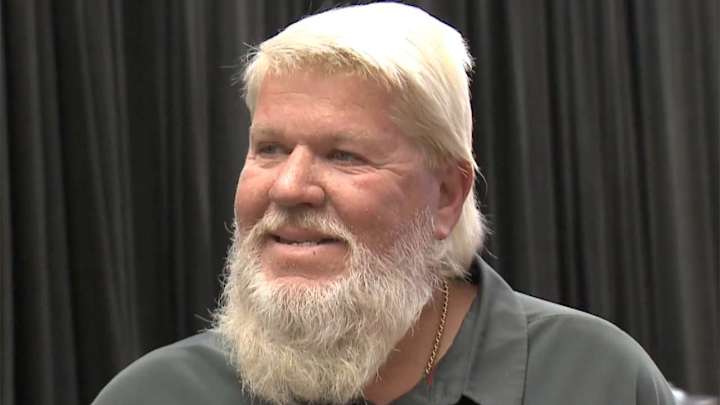 PGA golfer John Daly Crashes Outback Bowl Contract Signing to Hang with Pittman