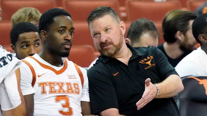 Texas Longhorns Roll Over West Virginia in Big 12 Opener, 74-59 Texas Longhorns Roll Over West Virginia in Big 12 Opener, 74-59