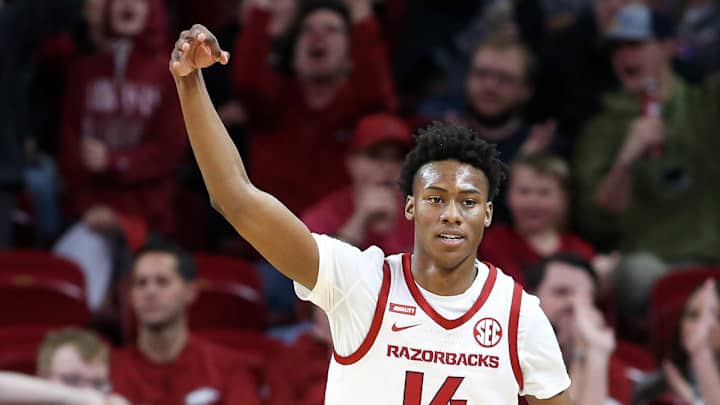 MEN'S BASKETBALL: Robinson, Johnson, Wade Spark Hogs on both Ends of the Floor for 81-55 win