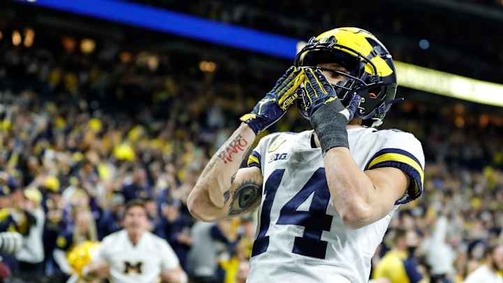 Perks of the Job: Michigan Players Unveil New Playoff Swag