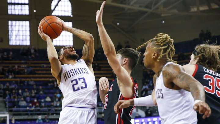 Huskies Reward Large Crowd with 2-OT Victory Huskies Reward Large Crowd with 2-OT Victory