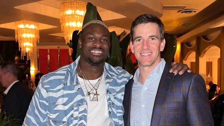 Former Rebels Eli Manning, DK Metcalf Pose for Tweet