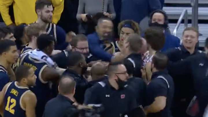 Michigan Coach Juwan Howard Swings at Wisconsin Assistant, Sparking Postgame Scuffle