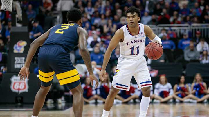 Agbaji leads Jayhawks to dominant 87-63 win over Mountaineers