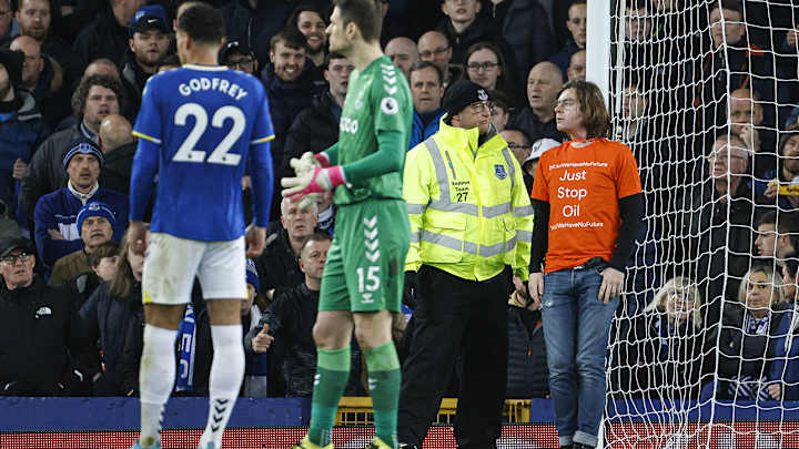 Protester Zip Ties Themself to Goalpost During Premier League Match