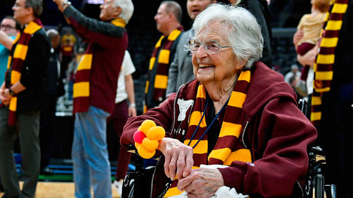 Sister Jean Gives Loyola-Chicago Pre-Game Pep Talk, Wearing Signature Balloon Flower Corsage Sister Jean Gives Loyola-Chicago Pre-Game Pep Talk, Wearing Signature Balloon Flower Corsage