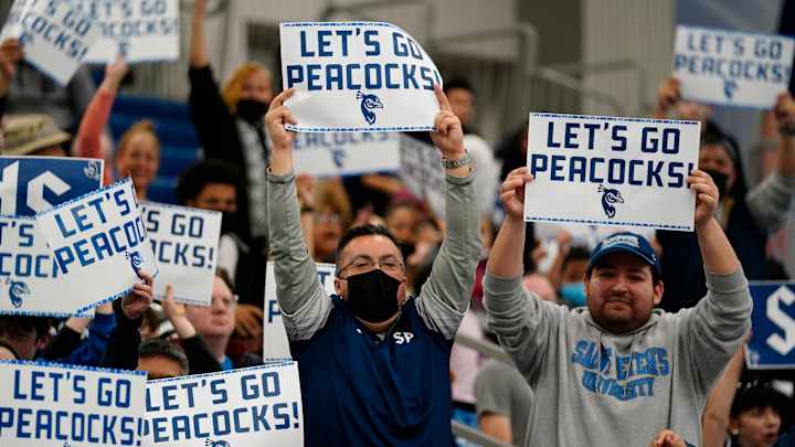 Saint Peter’s Cheerleading Squad Completes Incredible Journey To Watch Second Round NCAA Tournament Victory