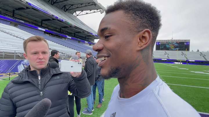 Sunday Toned Down His Style in Getting to Know New UW Coaches