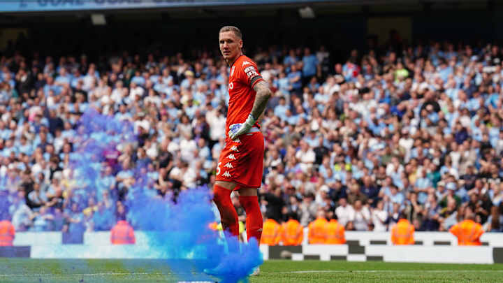 Aston Villa Goalkeeper Assaulted by Fans During Pitch Invasion
