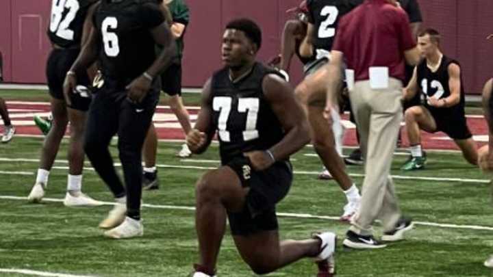 2023 OT Roderick Kearney learns from Alex Atkins at Elite Camp