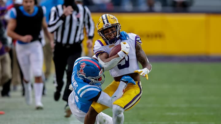 Who was the first person from Auburn to reach out to reciever Koy Moore?