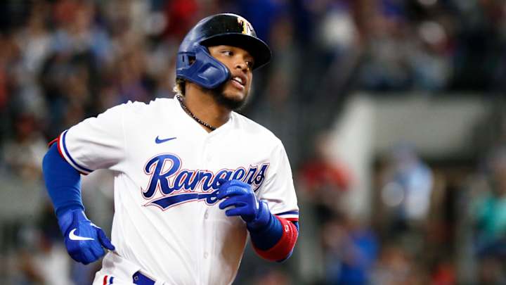 Calhoun's 'Lightning Hands' Feed Off Electric Crowd in Rangers' Win Over Red Sox Calhoun's 'Lightning Hands' Feed Off Electric Crowd in Rangers' Win Over Red Sox