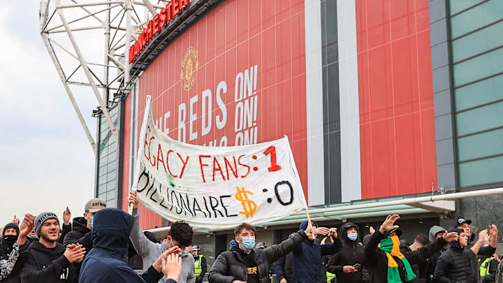Man United Fans Protest Again Ahead of Rescheduled Match vs. Liverpool Man United Fans Protest Again Ahead of Rescheduled Match vs. Liverpool